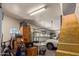 Spacious garage offering ample storage and parking with additional shelving at 8649 S Willow Dr, Tempe, AZ 85284