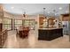 Open concept kitchen and dining area with a breakfast bar and stainless steel appliances at 8649 S Willow Dr, Tempe, AZ 85284