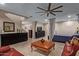 Versatile living space combines relaxation and sleeping quarters with neutral colors, great furniture, and good lighting at 8649 S Willow Dr, Tempe, AZ 85284