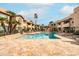 Beautiful community pool with lounge seating and inviting clear blue water at 9450 E Becker Ln # 2019, Scottsdale, AZ 85260