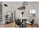 Bright dining area features a marble table, and a shiplap accent wall at 9450 E Becker Ln # 2019, Scottsdale, AZ 85260