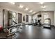 Well-equipped fitness center with machines and natural light at 9450 E Becker Ln # 2019, Scottsdale, AZ 85260