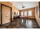 Bright community game room featuring a pool table, ceiling fan, and tile flooring at 9450 E Becker Ln # 2019, Scottsdale, AZ 85260