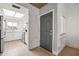 Modern white kitchen with stainless steel appliances, marble backsplash, and ample natural light at 9450 E Becker Ln # 2019, Scottsdale, AZ 85260