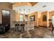Modern community lounge area featuring a stone bar, comfortable seating, and ample lighting at 9450 E Becker Ln # 2019, Scottsdale, AZ 85260