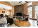 Community lounge featuring a stone fireplace, seating, and a cozy atmosphere at 9450 E Becker Ln # 2019, Scottsdale, AZ 85260