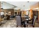 Large community lounge with a variety of seating options, a dining table, and modern amenities at 9450 E Becker Ln # 2019, Scottsdale, AZ 85260