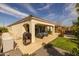 Open patio with outdoor cooking area and an outdoor lounge area, perfect for gatherings and relaxation at 10343 E Durant Dr, Mesa, AZ 85212