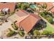 Aerial view showcases the home's tile roof, complemented by manicured landscaping and hardscape at 10500 E Mission Ln, Scottsdale, AZ 85258
