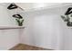 Well-organized walk-in closet with shelving, rods, and storage space to maximize wardrobe organization at 10500 E Mission Ln, Scottsdale, AZ 85258
