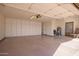 Spacious garage with built-in storage cabinets providing an organized and clutter-free space at 10500 E Mission Ln, Scottsdale, AZ 85258