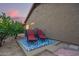 Cozy outdoor seating area with sunset views provides a peaceful retreat at 10500 E Mission Ln, Scottsdale, AZ 85258