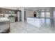 Modern kitchen boasts stainless appliances, dark wood cabinets, granite countertops, and center island at 1201 E Gemini Dr, Tempe, AZ 85283