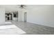 Open concept living room showcasing tile flooring that connects to the kitchen and other living spaces at 1201 E Gemini Dr, Tempe, AZ 85283