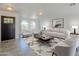 Bright living room features stylish furniture, a modern rug, and a decorative accent wall at 1201 E Gemini Dr, Tempe, AZ 85283