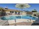 Sparkling backyard pool with an adjacent diving board and lounge area at 1201 E Gemini Dr, Tempe, AZ 85283