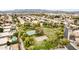 An aerial view presents a comprehensive layout of community amenities, including a park with sports courts and green spaces at 1235 W Jeanine Dr, Tempe, AZ 85284