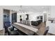 Open floor plan combines dining and kitchen areas with a view of the patio at 13734 W Harvest Ave, Litchfield Park, AZ 85340