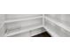 A walk-in pantry with shelving for organized storage at 13734 W Harvest Ave, Litchfield Park, AZ 85340