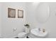 Powder room with modern fixtures and decor at 13734 W Harvest Ave, Litchfield Park, AZ 85340