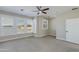 Bedroom featuring plush carpet, ceiling fan and windows with white shutters at 1400 E Bethany Home Rd # 27, Phoenix, AZ 85014