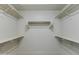Walk-in closet with shelves, providing ample storage space at 1400 E Bethany Home Rd # 27, Phoenix, AZ 85014