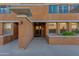 Private entrance showcasing brick accents and a covered walkway to the front door at 1400 E Bethany Home Rd # 27, Phoenix, AZ 85014