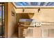 Modern community outdoor grill station includes lighting, grill and prep area at 1400 E Bethany Home Rd # 27, Phoenix, AZ 85014