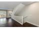 Interior view of the staircase with white railing, leading to the upper level at 1400 E Bethany Home Rd # 27, Phoenix, AZ 85014