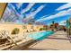 Outdoor swimming pool with clear blue water and lounge chairs for relaxation at 1400 E Bethany Home Rd # 27, Phoenix, AZ 85014