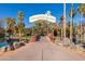 Entrance to Enchanted Island amusement park, surrounded by lush landscaping and palm trees at 1622 N 17Th Ave, Phoenix, AZ 85007