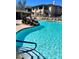 Sparkling community pool with water feature and lounge seating at 16800 E El Lago Blvd # 2027, Fountain Hills, AZ 85268