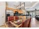 Charming kitchen with wooden cabinets, stainless steel appliances, and an adjacent dining area at 17228 N Estrella Vista Dr, Surprise, AZ 85374