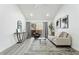 Chic living room featuring a balcony, modern furniture, and neutral tones at 1942 S Emerson -- # 222, Mesa, AZ 85210