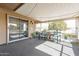 Enjoy the outdoors in this screened porch with plenty of room to relax and a view of the outside at 19613 N Signal Butte Cir, Sun City, AZ 85373