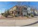 Charming two-story home featuring a stucco exterior, a two-car garage, and a desert-landscaped front yard at 1993 E 37Th Ave, Apache Junction, AZ 85119