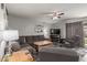 Spacious living room with neutral paint, a ceiling fan, and comfortable seating at 1993 E 37Th Ave, Apache Junction, AZ 85119