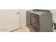 Convenient laundry room with modern washer and dryer units next to the door at 2117 E Oriole Dr, Gilbert, AZ 85297