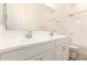 A bathroom featuring a dual-sink vanity and shower-tub combination at 21960 E Saddle Ct, Queen Creek, AZ 85142