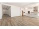 A spacious living room flows into the kitchen with an open floorplan at 21960 E Saddle Ct, Queen Creek, AZ 85142