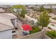 Aerial view of fenced backyard featuring desert landscaping, a brick paver patio, and covered seating area at 22651 E Via Del Verde --, Queen Creek, AZ 85142