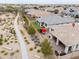 Expansive aerial view of homes with backyard patios and desert landscaping and sidewalks at 22651 E Via Del Verde --, Queen Creek, AZ 85142