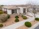 An exterior elevation shows the front of the home with low maintenance landscaping and walkway at 22651 E Via Del Verde --, Queen Creek, AZ 85142