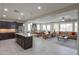 Open floor plan showcasing the kitchen, dining area, and living room filled with natural light at 22651 E Via Del Verde --, Queen Creek, AZ 85142