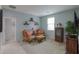 Inviting living room with comfortable seating, stylish decor, and soft, neutral carpet flooring at 22651 E Via Del Verde --, Queen Creek, AZ 85142