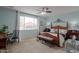 Comfortable main bedroom with a four-poster bed and neutral carpet at 22651 E Via Del Verde --, Queen Creek, AZ 85142