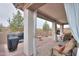 Covered patio with stone columns, a ceiling light and brick pavers leads to seating and a water feature at 22651 E Via Del Verde --, Queen Creek, AZ 85142