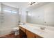 A bathroom with a tile floor and a single sink vanity at 23225 N 23Rd Pl, Phoenix, AZ 85024