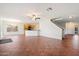 Open-concept kitchen and living room with tile floors, recessed lighting, and access to the backyard at 23225 N 23Rd Pl, Phoenix, AZ 85024