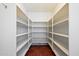 A walk-in pantry with many shelves for optimized storage at 23225 N 23Rd Pl, Phoenix, AZ 85024